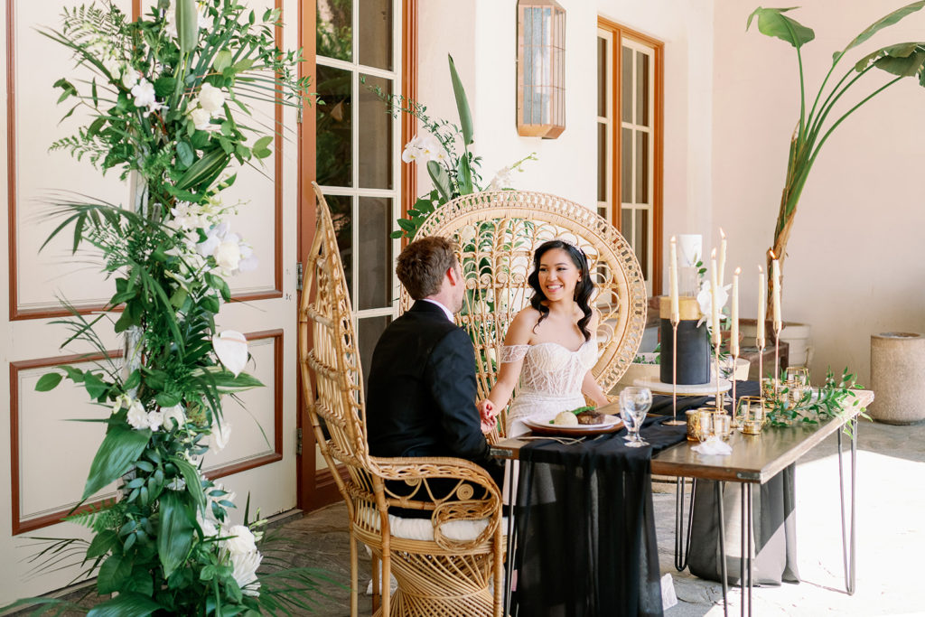 modern wedding in Menifee with peacock chairs sweetheart table 