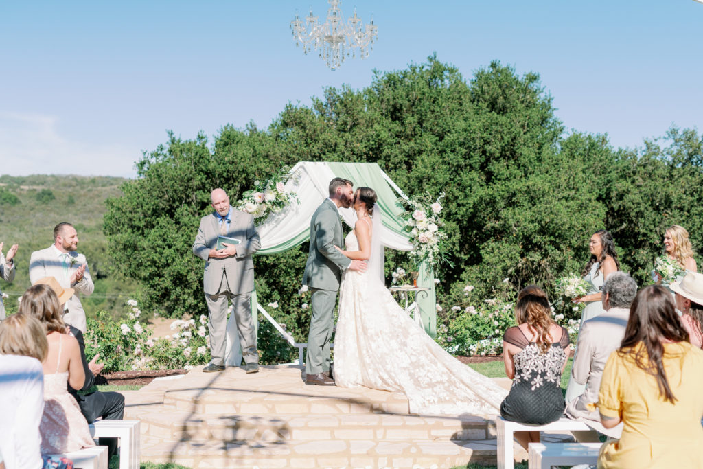 wedding ceremony kiss in temecula California at forever and always farm