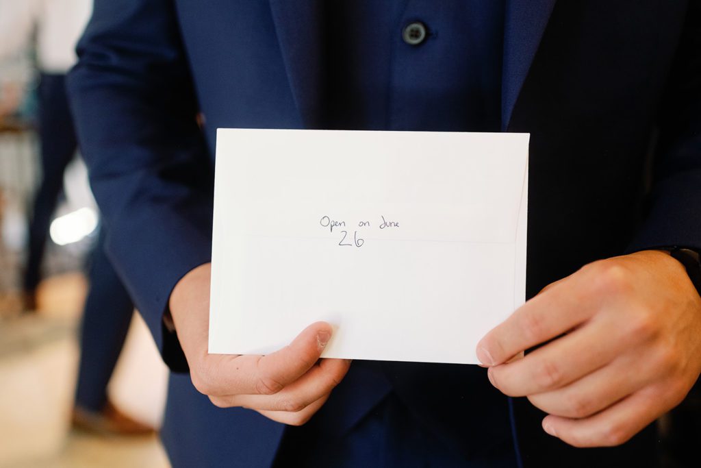groom writing letter to bride 