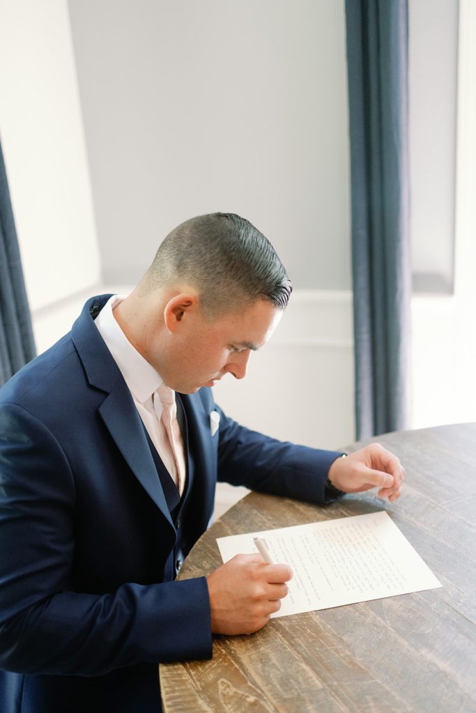 groom writing letter to bride 