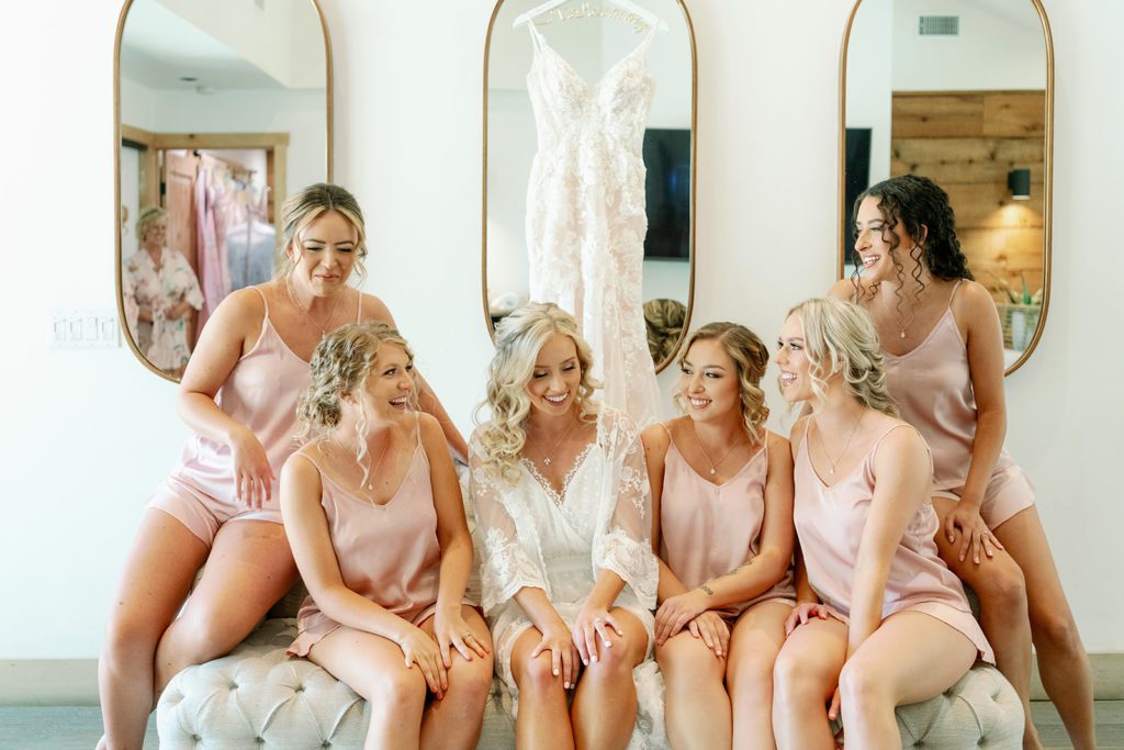 bride with bridesmaids in pink pajamas 