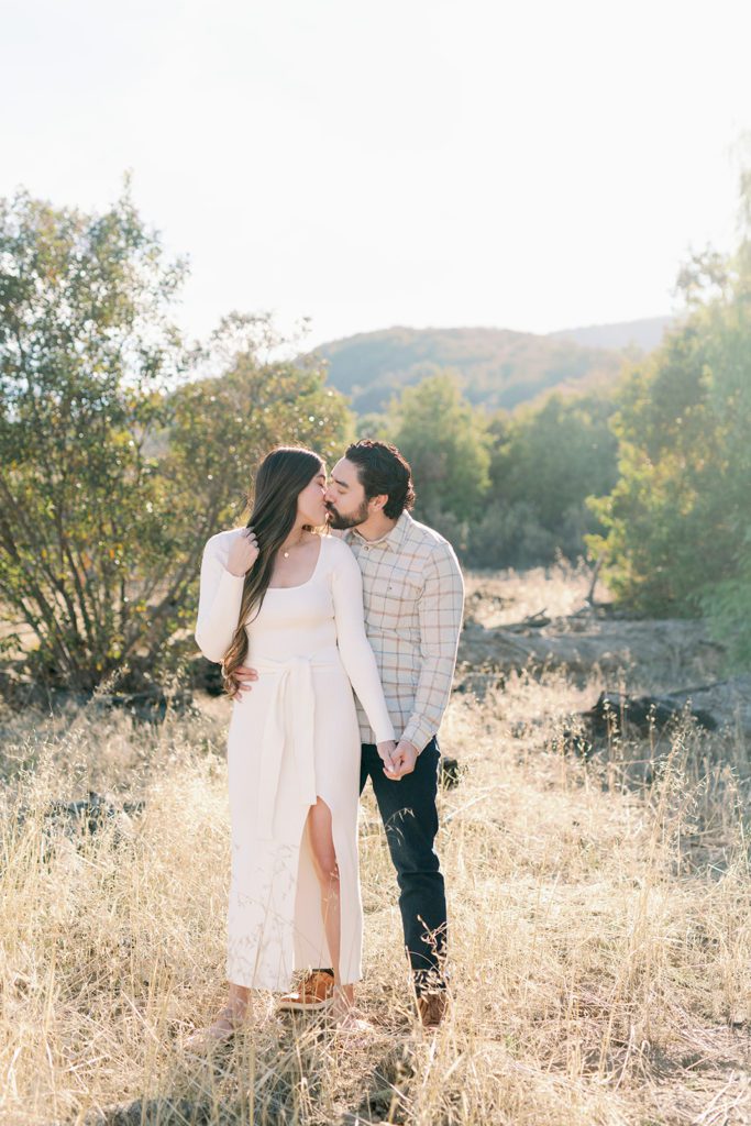 Temecula California engagement photography, couple in open field, girl in white dress  