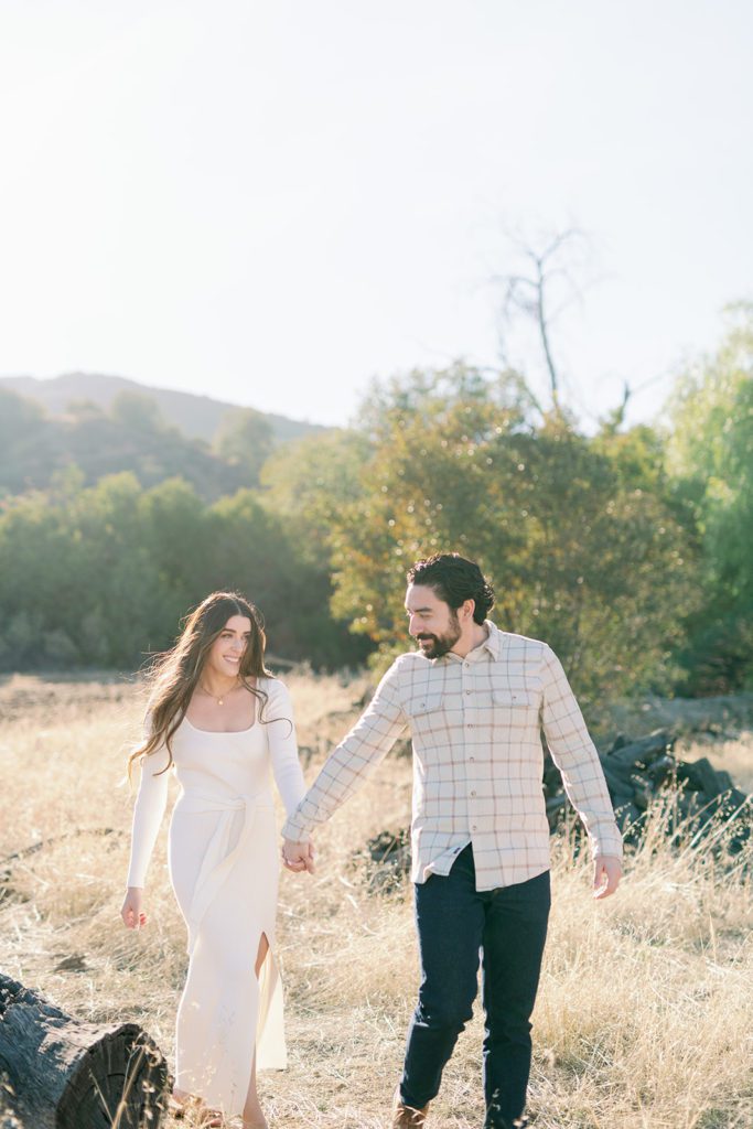 couple engagement photos with bright colorful editing style Temecula California, couple walking in field