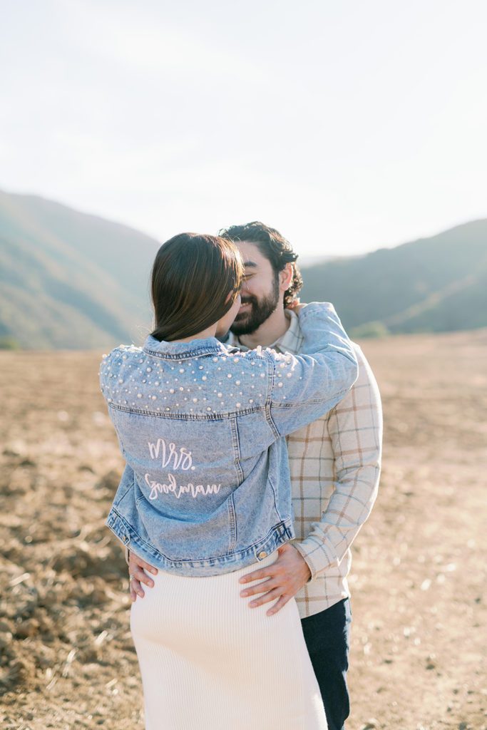 photo locations in corona California engagement photography in open field with mrs jean jacket 