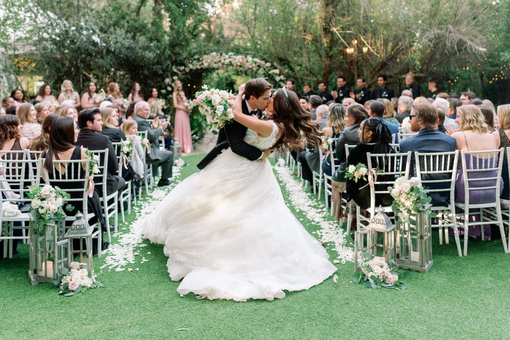 Twin Oaks Gardens Wedding ceremony kiss down the aisle 