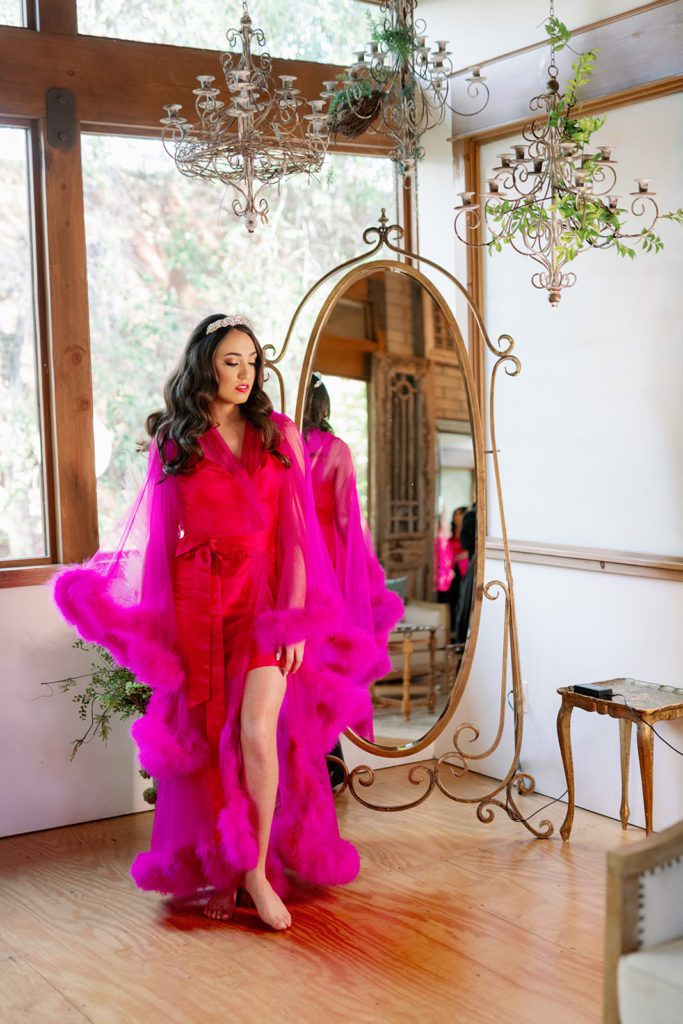 Twin Oaks Gardens Wedding Bride with Hot Pink Feather Robe 