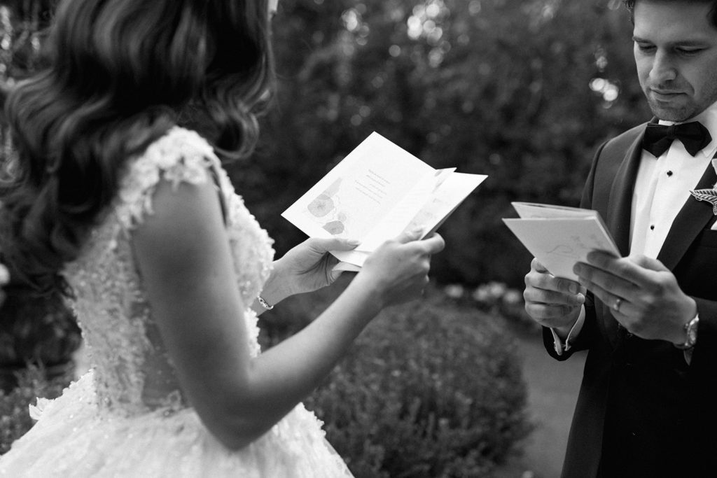 Twin Oaks Gardens Wedding bride and groom first look and vow reading